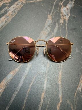 Ray-Ban round Gold Frame Sunglasses with Rose Lenses